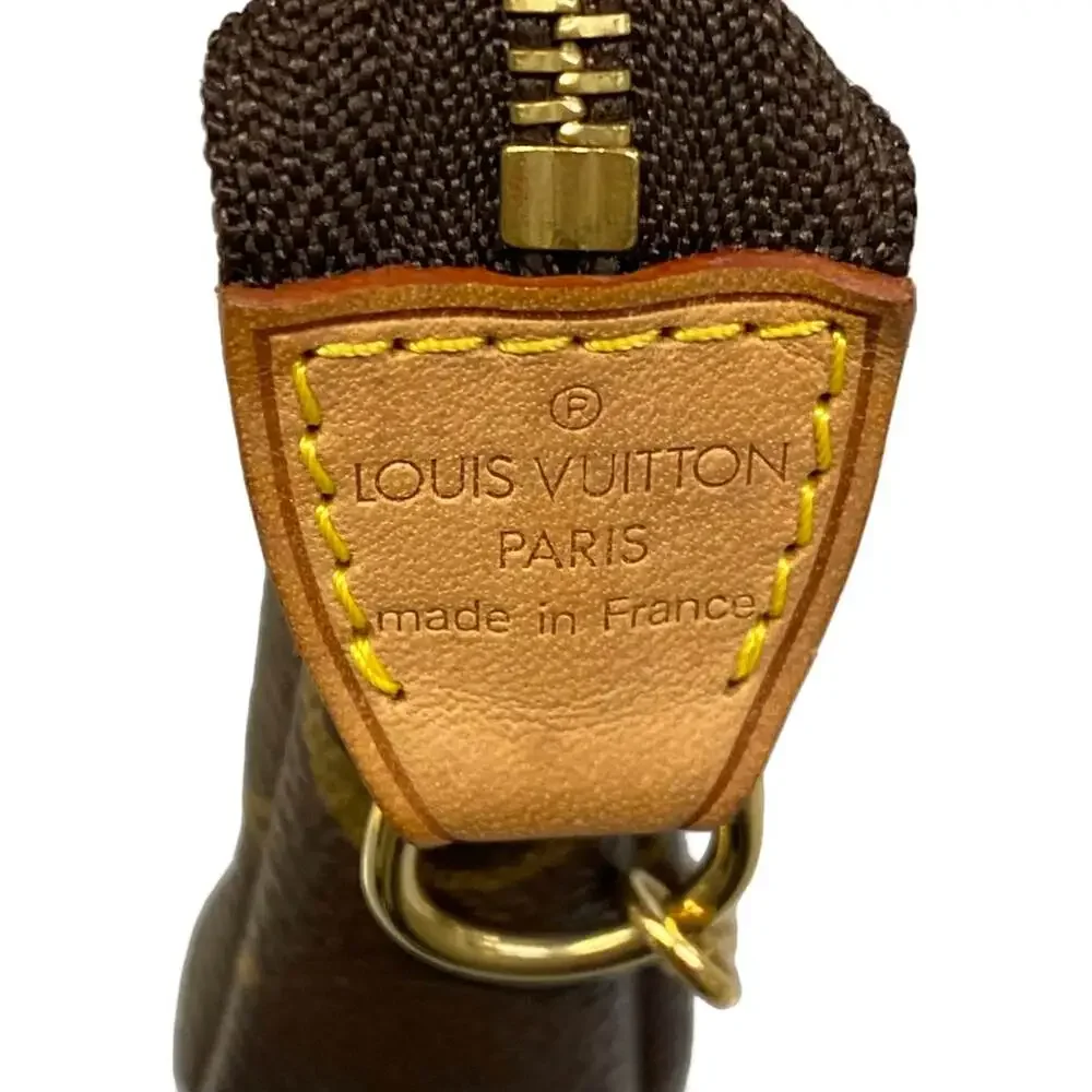 Louis Vuitton Mini Pochette Accessoires Monogram Handbag M58009
